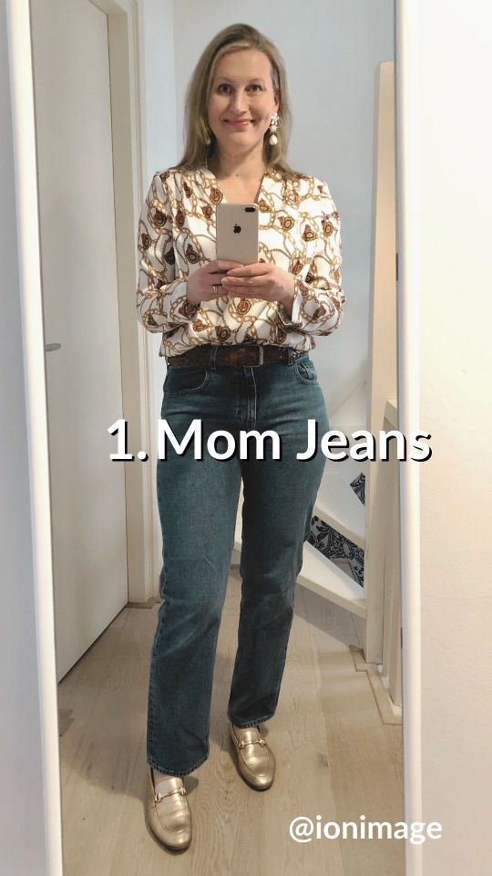 Wearing a printed shirt wit mom jeans