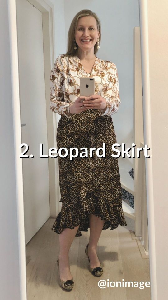 Wearing a printed shirt with a leopard skirt