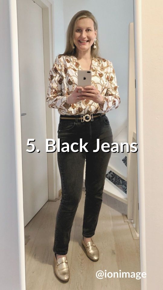 Wearing a chain blouse with black jeans